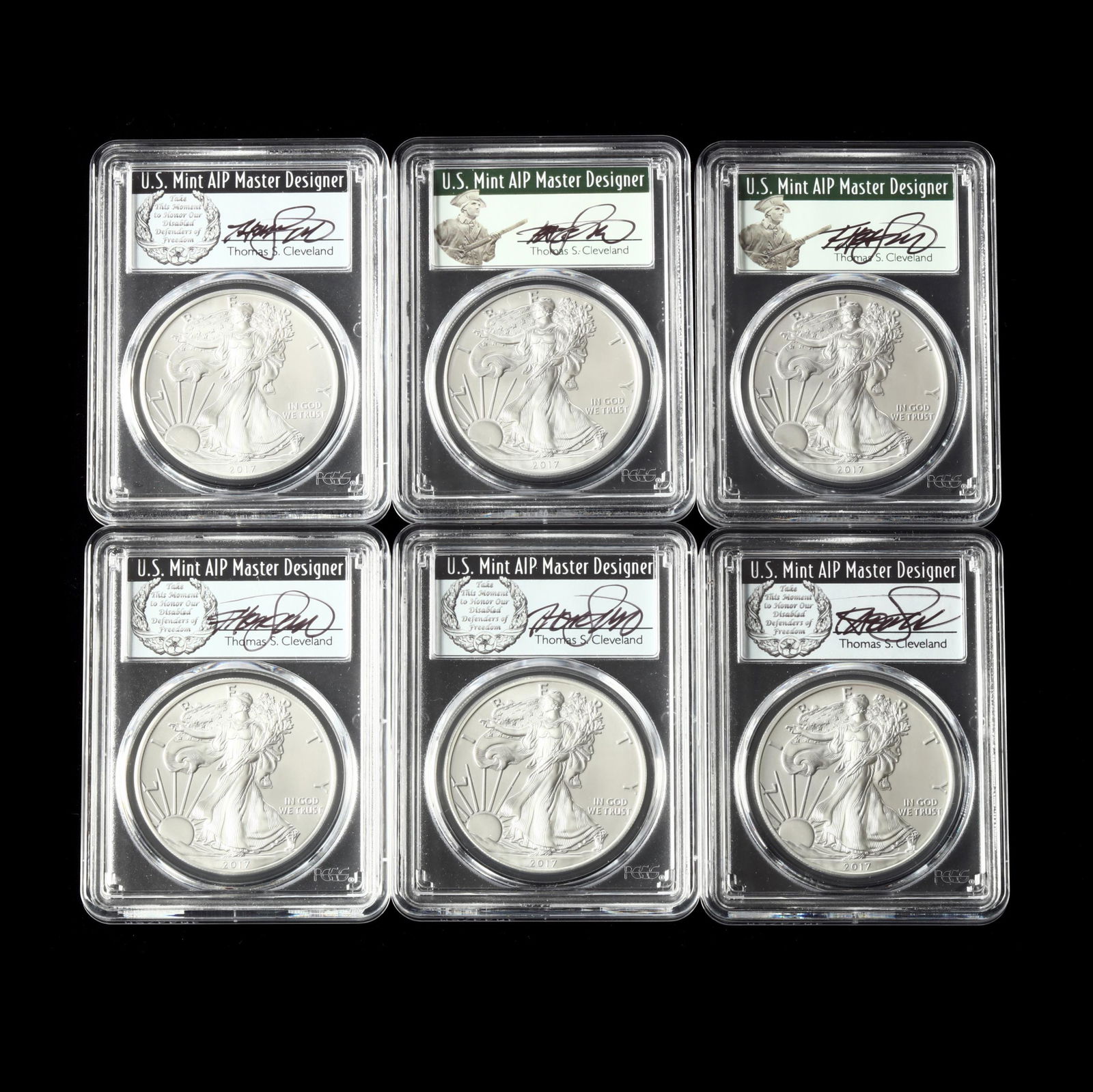 Six (6) Graded $1 Silver American Eagles Signed by Thomas S. Cleveland (1 of 2)