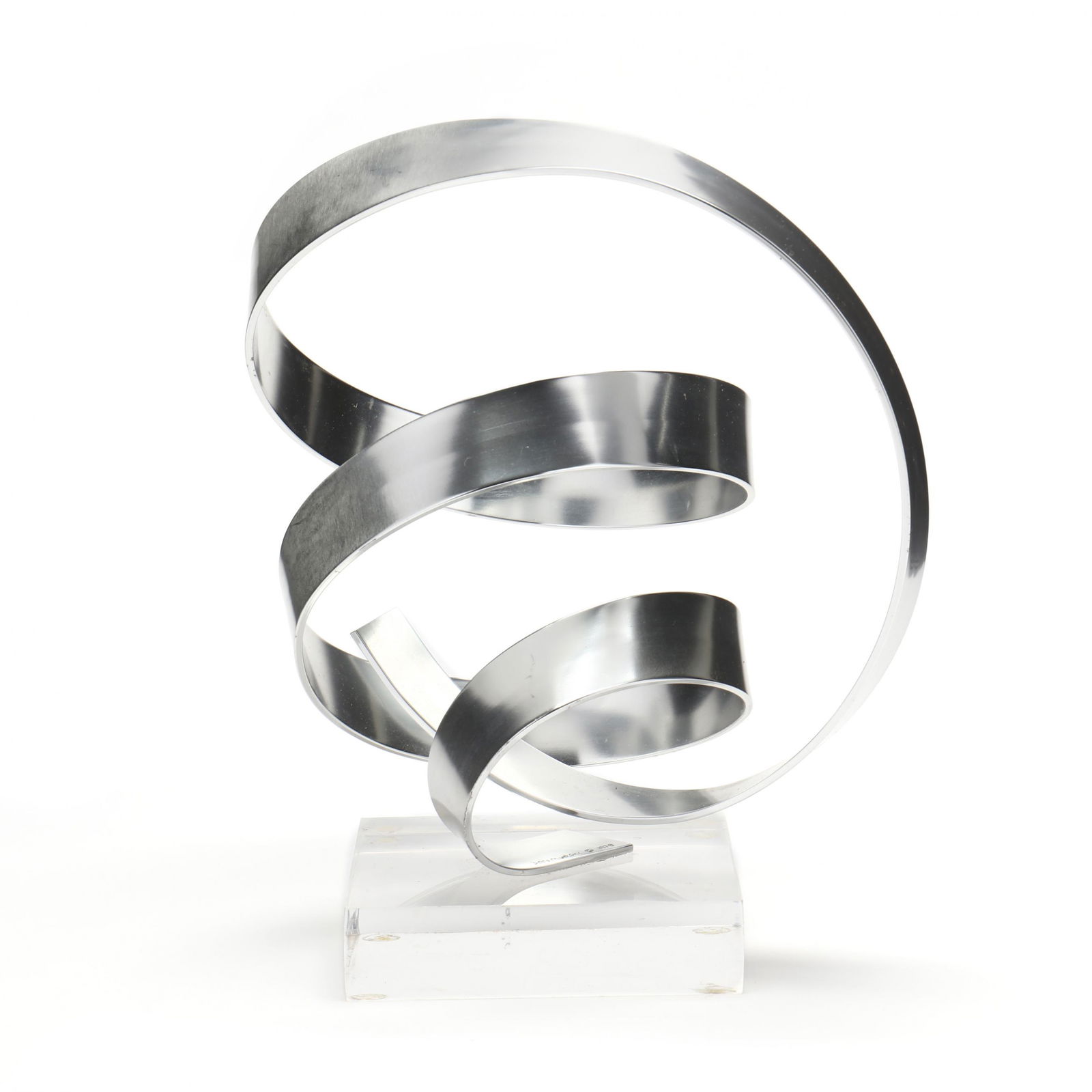 Dan Murphy (NC), Abstract Ribbon Sculpture: Dan Murphy (NC), Abstract Ribbon Sculpture1979, anodized and polished aluminum or stainless steel, sculpture mounted to a clear acrylic stand, signed and dated. 8.5 x 7 x 7 in. Additional high-resolu