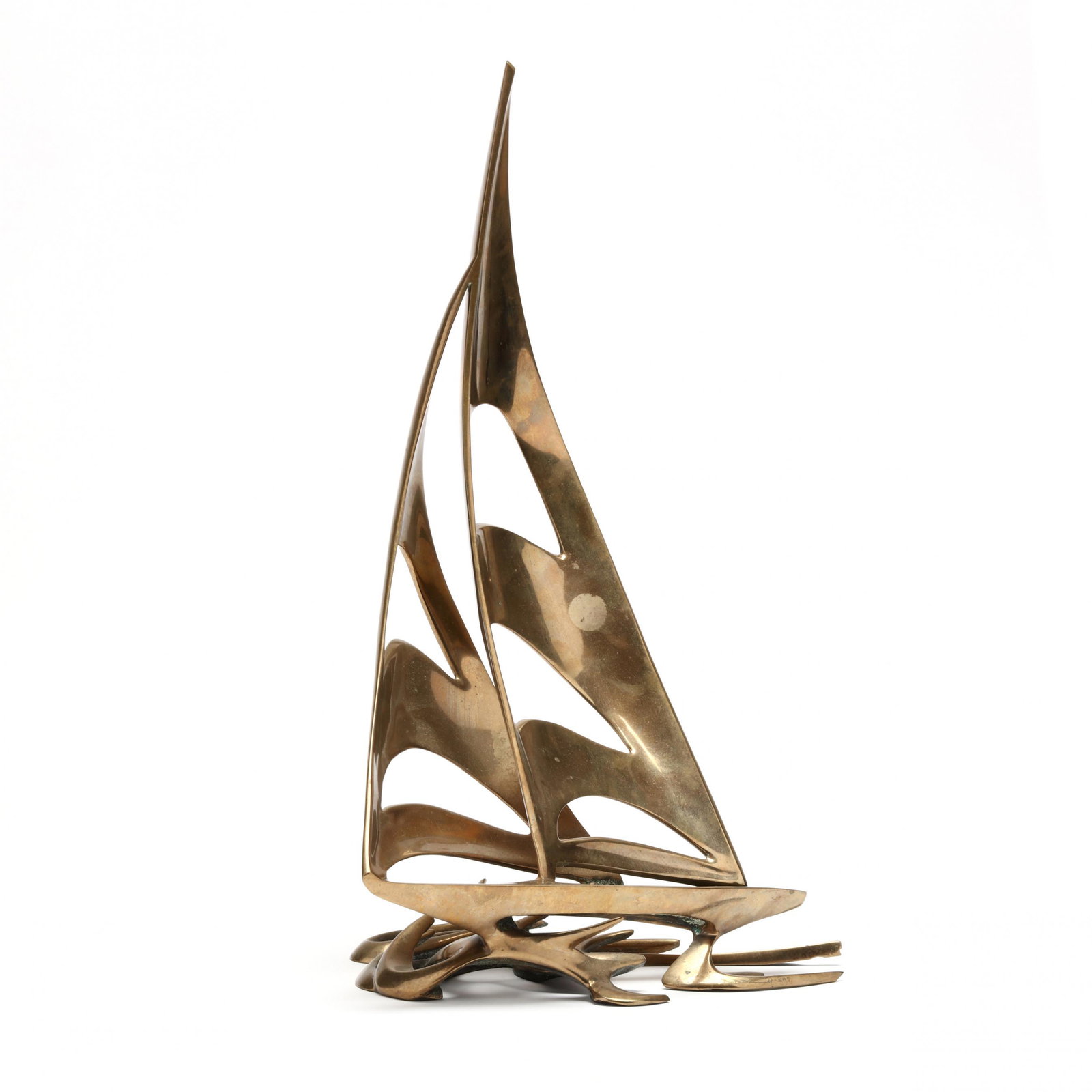 attributed Bob Bennett (American, b. 1928), Bronze Sculpture of a Sailing Vessel: attributed Bob Bennett (American, b. 1928), Bronze Sculpture of a Sailing Vesselpolished cast bronze, depicting a dynamic form of a sailing vessel skimming wind swept waves, with incised "MH" or "HW"