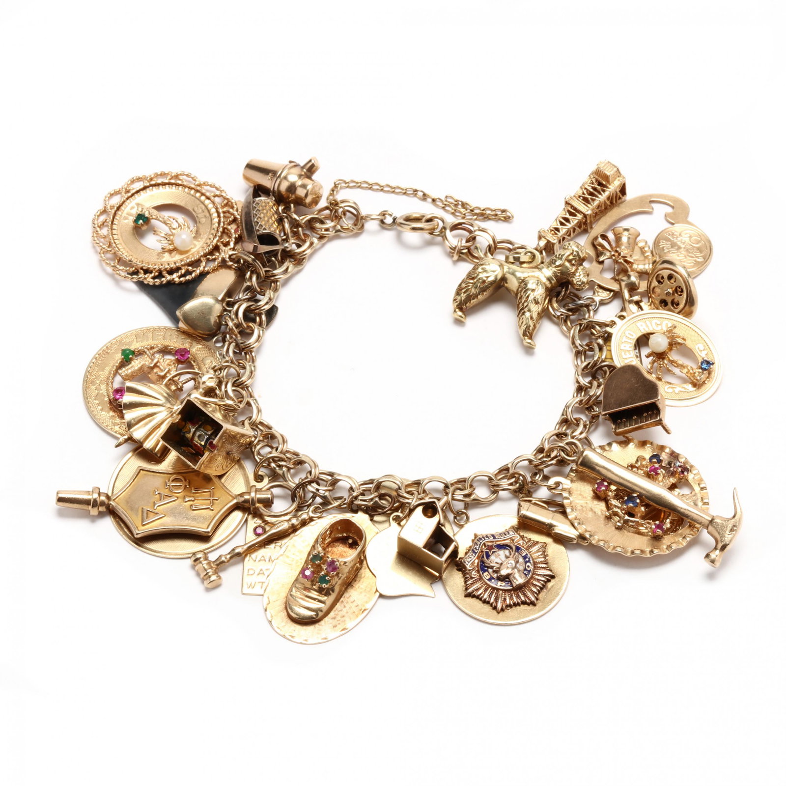 Gold Filled Charm Bracelet with Gold and Gold-Filled Charms: Gold Filled Charm Bracelet with Gold and Gold-Filled Charms the round double link charm bracelet with (30) charms to include: a poodle stamped 14K; an oil derrick stamped 14K; a Happy Anniversary char