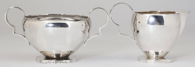 Frantz Hingelberg Sterling Silver Creamer & Sugar: Frantz Hingelberg Sterling Silver Creamer & Sugar likely designed by Svend Weihrach, with Danish hallmarks, produced in 1931, strong Art Deco form with stylized "calligraphy" design to round foot. 3.5