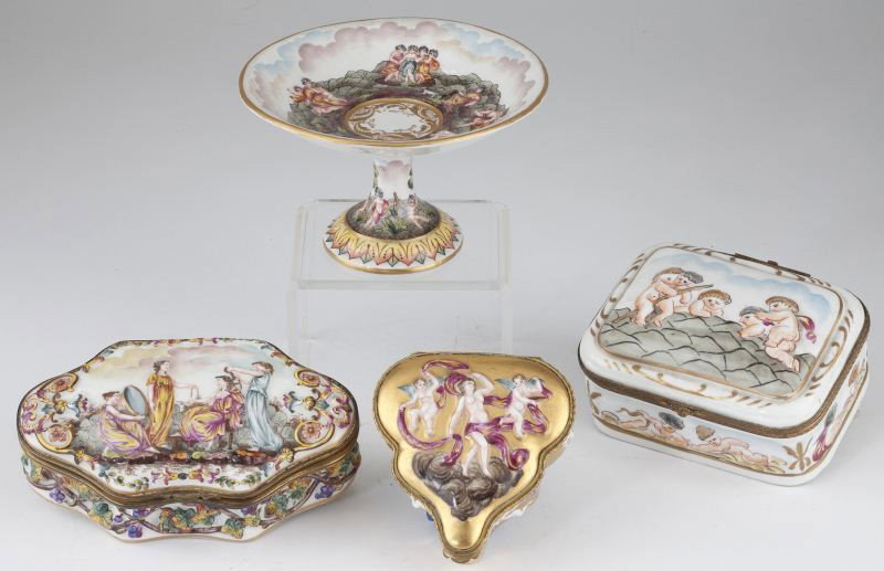 Group of Four Capodimonte Dresser Items: Group of Four Capodimonte Dresser Items (3) boxes with hinged lids and a jewelry tazza, all relief decorated with classical themes and putti, bottom marked with crown over "N". 1.25-3 in.