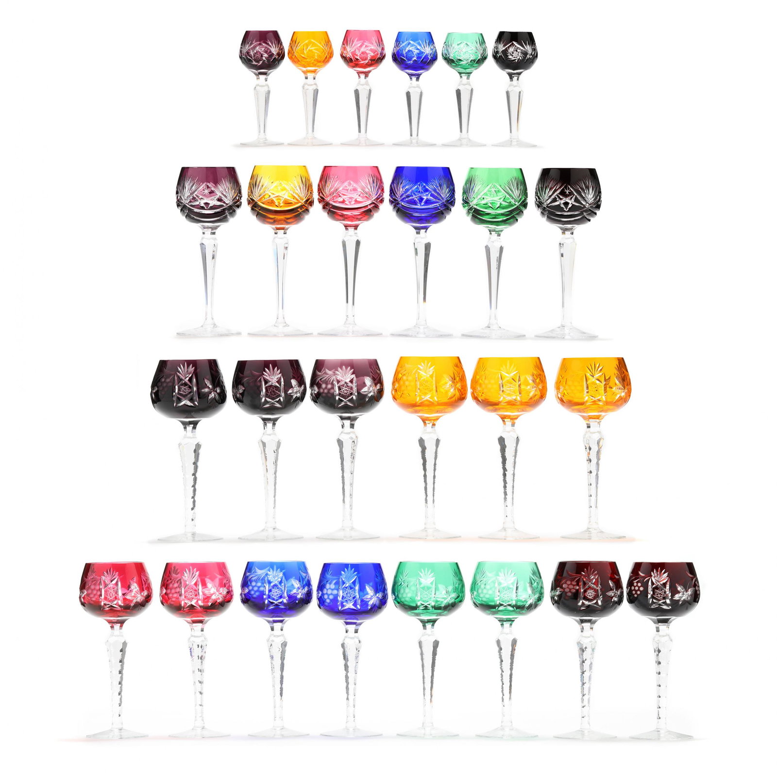 A Group of Twenty-Six Cut-to-Clear Wine Stems: A Group of Twenty-Six Cut-to-Clear Wine Stems second half 20th century, likely Bohemian, in various colors with wheel cut grape cluster and hobstar motif, including twenty wine glasses (7.75 in.), and