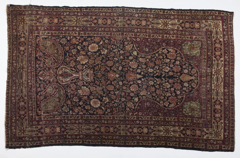 Antique Kirman Prayer Rug: Antique Kirman Prayer Rug late 19th century, with floral mihrab and boteh corners on a blue field, with five floral guard borders of red and tan. 6' 9' x 4' 3"