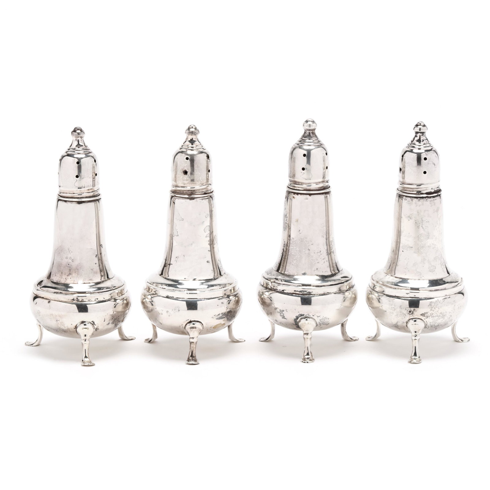 A Grouping of Five Sterling Silver Table Accessories: A Grouping of Five Sterling Silver Table Accessoriesincluding a Georg Jensen Cactus bottle opener, marked "Denmark / Sterling" to handle (4 3/4 in.); and a set of (4) footed and glass lined salt and p