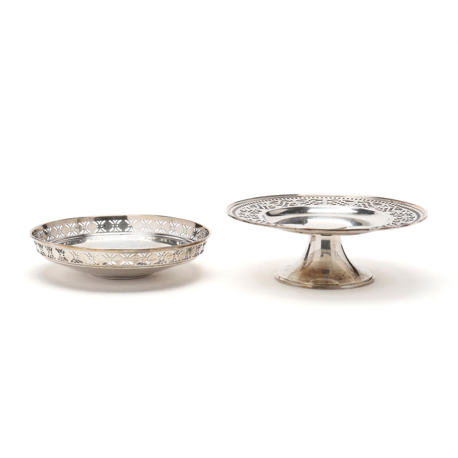 Two Tiffany & Co. Sterling Silver Table Accessories: Two Tiffany & Co. Sterling Silver Table Accessoriesboth with circa 1907-1947 period hallmarks; the first a small tazza with cutwork design to rim, pattern number 18388A, no monogram (2 x 6 1/4 in. dia