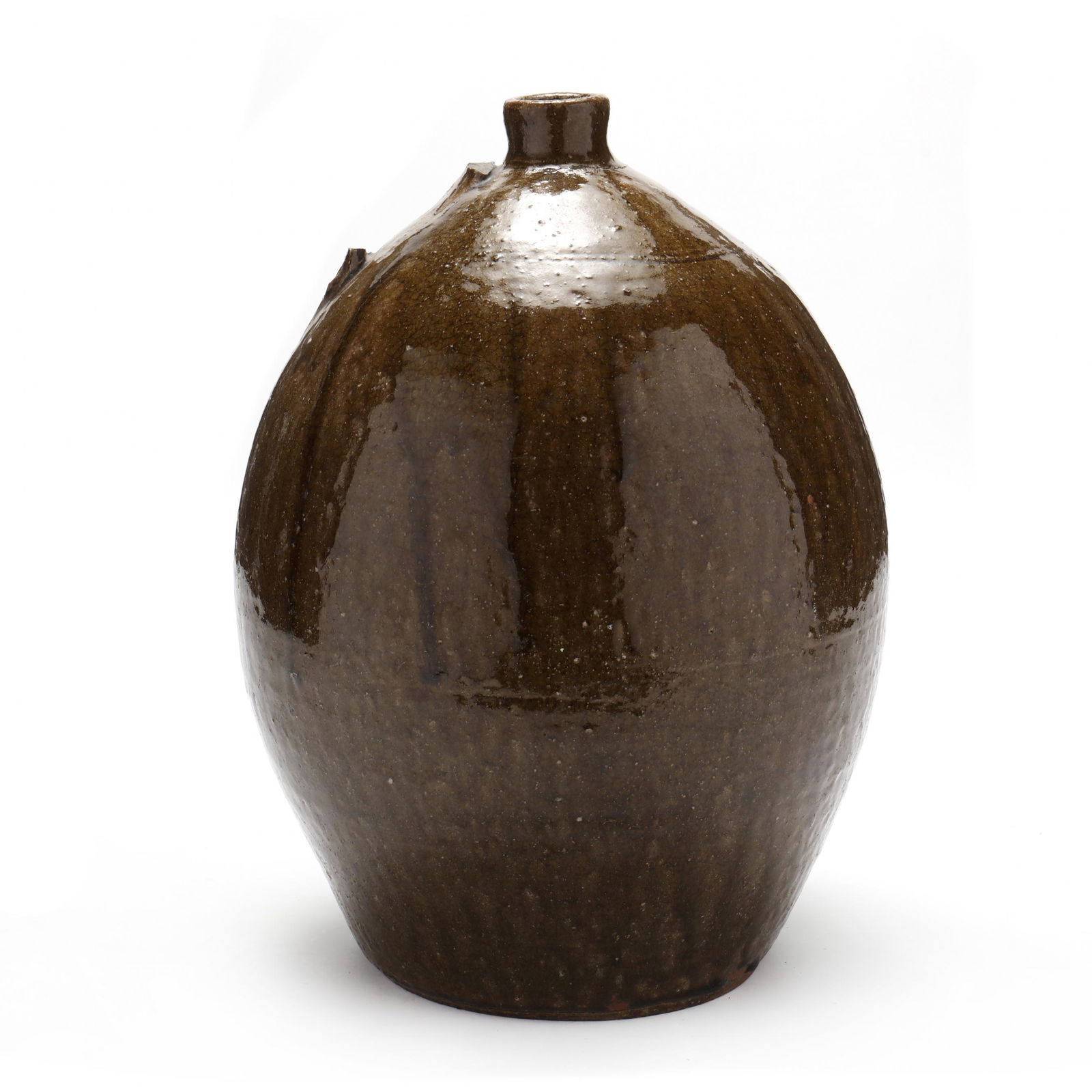 John Goodman (1822-1907 Lincoln County, NC), Four Gallon Jug: John Goodman (1822-1907 Lincoln County, NC), Four Gallon Jugalkaline glazed stoneware, highly ovoid form, incised lines at the shoulder above stamp "JG 4". 15 1/2 in. Private Collection, Concord, Nort