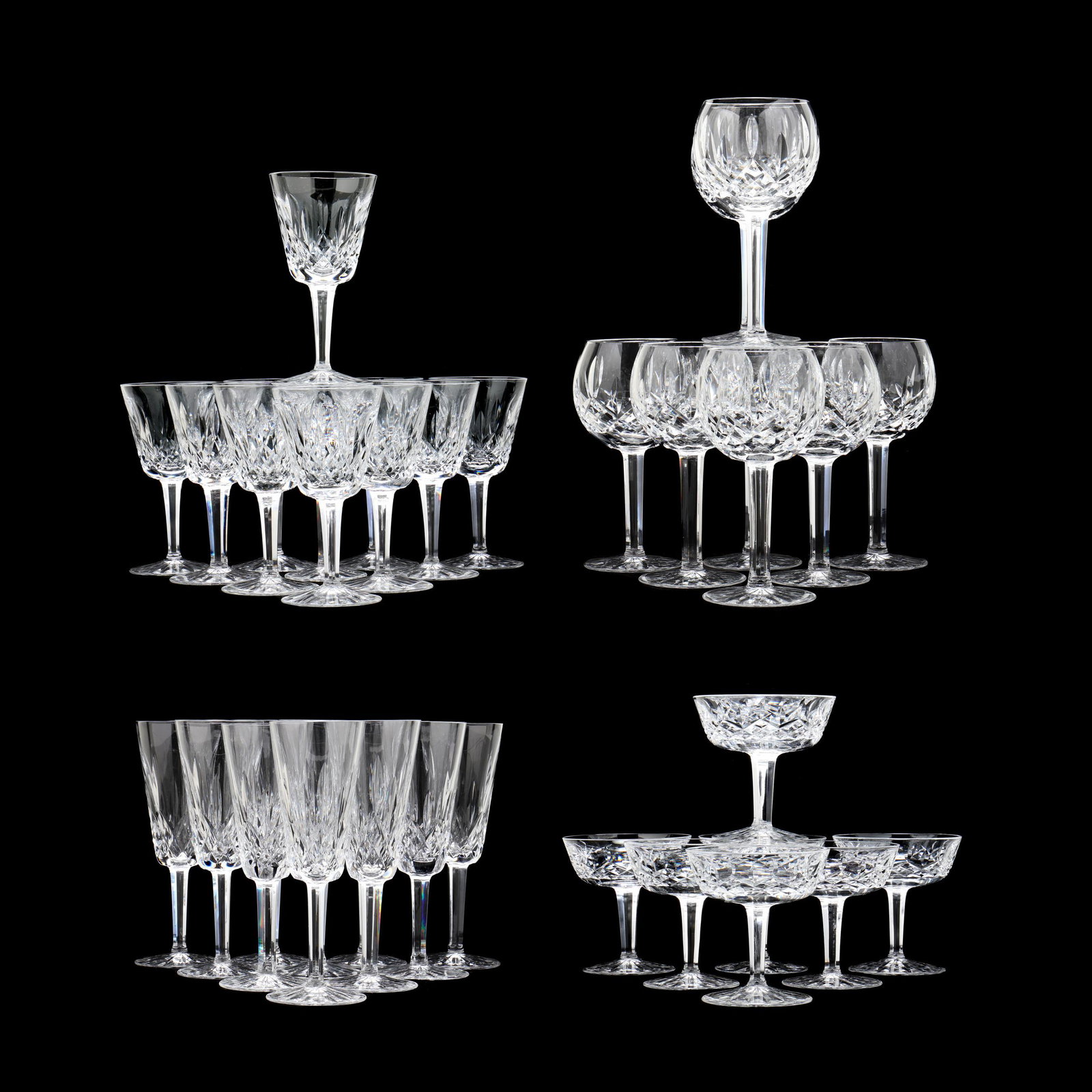 (37) Pieces of Waterford Crystal Lismore Stems: (37) Pieces of Waterford Crystal Lismore Stems including: eight wine goblets (7.25 in.), ten champagne flutes (7.25 in.), eleven white wine stems (5.75 in.), and eight champagne coupes (4.25 in.), mar