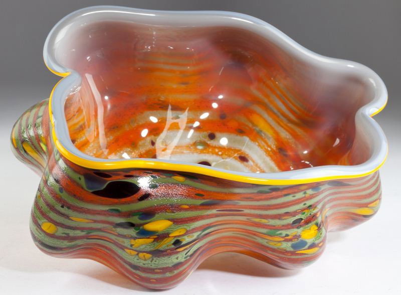 Custom Dale Chihuly Macchia Loop Basket: Custom Dale Chihuly Macchia Loop Basket (American, b. 1941) Macchia series of mixed earth tones with bright yellow and orange with fading purple interior. Signed "For Neil & Ippy, Chihuly 1983." 5.25 