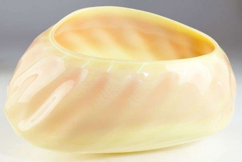 Dale Chihuly Seaform Basket: Dale Chihuly Seaform Basket (American, b. 1941) custard and peach blown bowl with striations of white. Signed "Chihuly 1981." 5.75 x 10.5 x 7.5 in. Collection of Ippy & Neil Patterson of Hillsborough,