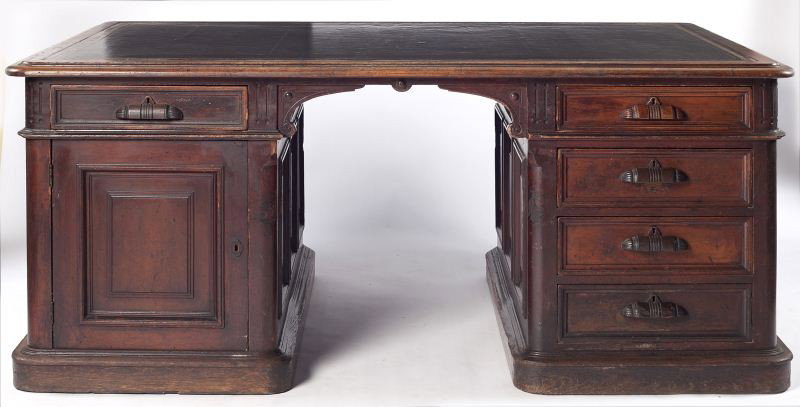 New York Partners Desk: New York Partners Desk made by Cutler Furniture Company, Buffalo, NY, cherry, late 19th century, having a tooled leather top over central kneehole flanked by four single drawers on the right, and sing