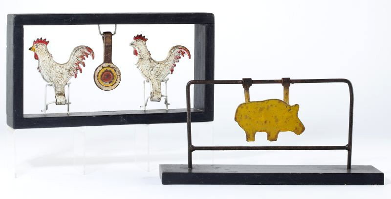 Rare Hubley Carnival Target: Rare Hubley Carnival Targetpaint decorated cast iron roosters from a shooting gallery, presented in custom display stand (DOA 7.5 x 13 x 2 in.) Included: a pressed steel pig carnival target also in cu