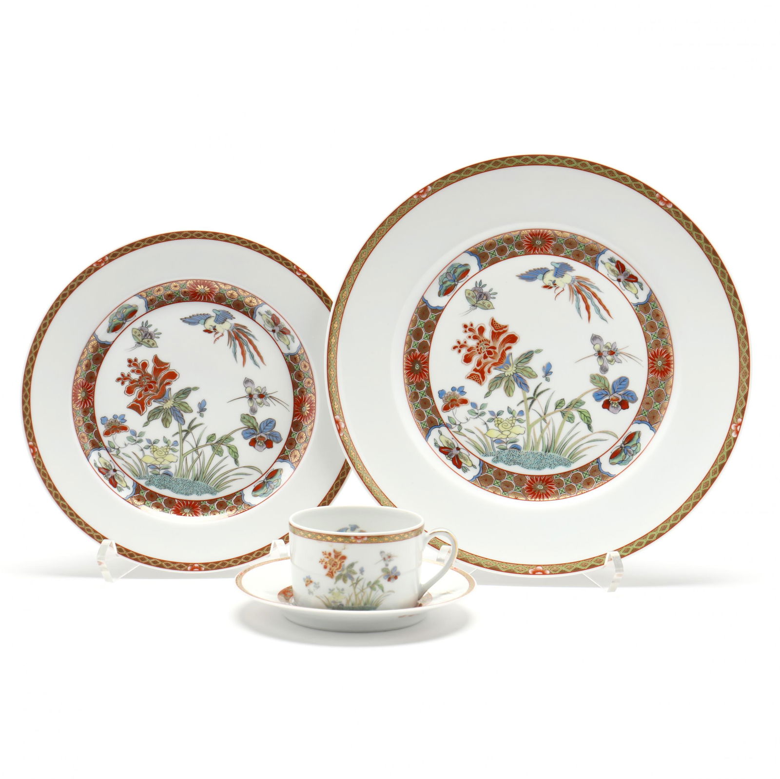 (51) Pieces of Bernardaud Limoges Chef d' Oeuvre Dinner Ware: (51) Pieces of Bernardaud Limoges Chef d' Oeuvre Dinner WareFrance, 20-21st century, Asian inspired decoration, to include: (12) dinner plates (10 1/4 in.); (12) salad plates (8 3/8 in.); (12) cups w