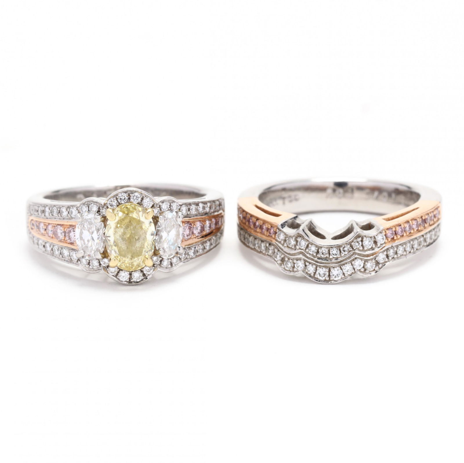 Platinum and Gold Fancy Intense Yellow Diamond and Diamond Ring and Band, Charles Krypell: Platinum and Gold Diamond Ring and Band, Charles Krypell the platinum engagement ring featuring an oval modified brilliant cut natural fancy intense yellow diamond (7.25 x 5.30 x 3.30 mm) weighing 1.0
