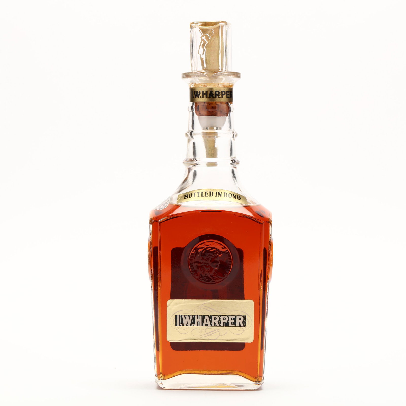 I.W. Harper Bourbon Whiskey in Glass Decanter: I.W. Harper Bourbon Whiskey in Glass Decanter The buyer acknowledges that he/she is acting within compliance with their state and local laws in regards to the purchase, transportation and delivery of 