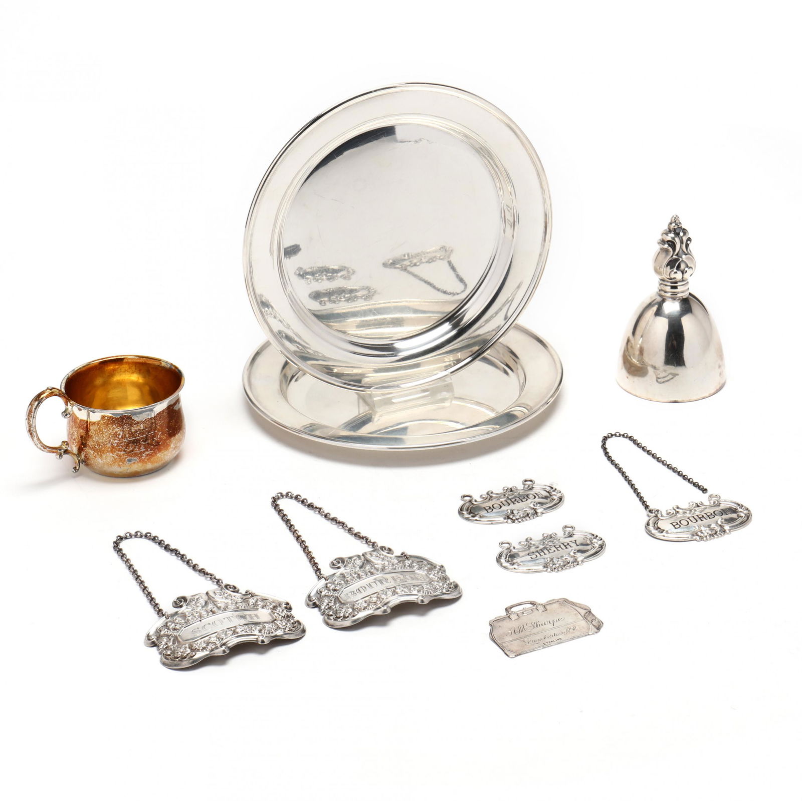 Six Sterling Silver Tags and Assorted Table Accessories: Six Sterling Silver Tags and Assorted Table Accessories(11) pieces, including (5) decanter tags: (3) engraved BOURBON, one engraved SHERRY, and another SCOTCH; the sixth a luggage tag in tote form, en