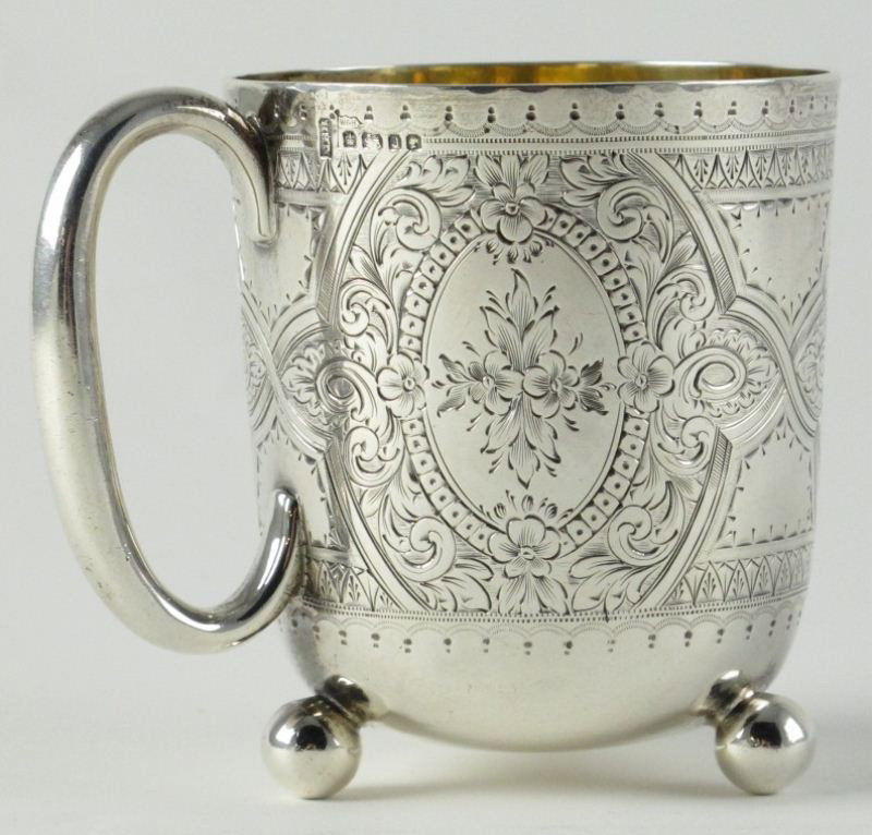 Sheffield Sterling Footed Cup: Sheffield Sterling Footed Cup (London, 1876), with duty mark of Queen Victoria I (1838-1890), Walker & Hall maker's mark and John Edward Bingham maker's mark; heavily engraved with florals and swags, 