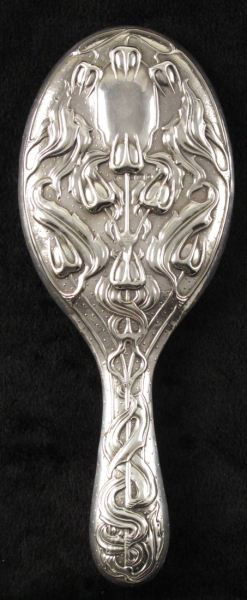 English Sterling Silver Hand Mirror: English Sterling Silver Hand Mirror(Birmingham, 1902), beautifully engraved with trident-shaped flower buds and leaves in relief, maker's mark of William Hutton & Sons, some slight denting to rim and