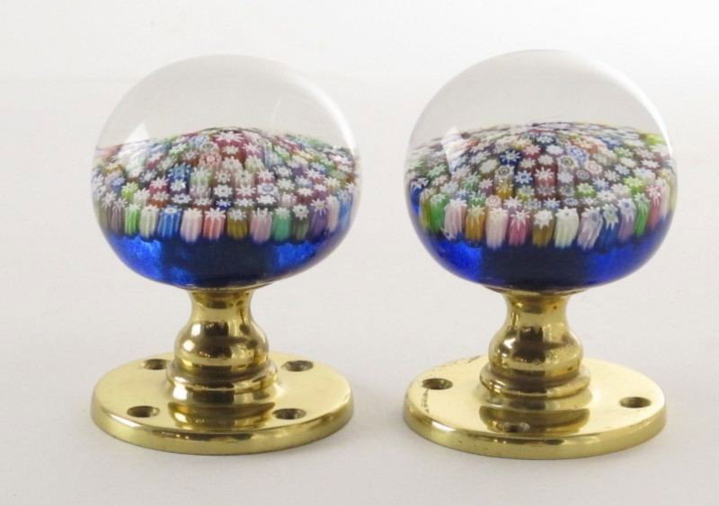 Perthshire Millefiori Glass Doorknobs: Perthshire Millefiori Glass Doorknobs Crieff, Scotland; each of fine Italian design multi-colored cased millefiori, each signed "P" in center, mounted to brass. DOA: 3 x 2.5 in.