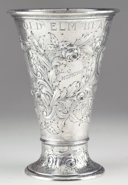 Gorham Sterling Silver Trophy Vase: Gorham Sterling Silver Trophy Vaseearly 20th century, trumpet form with bold floral repousse decoration, engraved "Old Elm Beaker" and monogrammed "L. J. Hopkins," retailed by Spaulding & Co. in Chica
