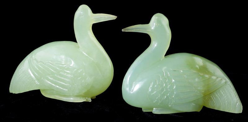 Pair of Chinese Green Jade Cranes: Pair of Chinese Green Jade Cranes (or Nephrite), 20th century, hand-carved in the form of nesting birds. 3.5 x 4 in.