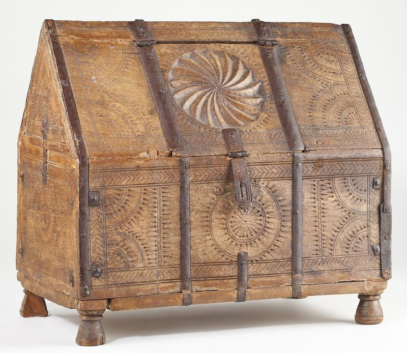 Spanish Sacristy Chest: Spanish Sacristy Chest mid 19th century, carved chestnut, rectangular arched one piece form, central hinged lid with embossed spiral to reveal open compartment case and remaining panels with allover g