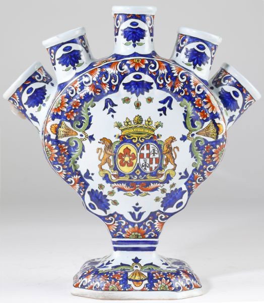 Henriot Quimper Faience Tulipiere: Henriot Quimper Faience Tulipierepottery vase circa 1870s, with eight spouts, coat-of-arms decoration to sides, bottom marked with a red "P" likely representative of Porquier-Beau.9.75 in.Estate of th