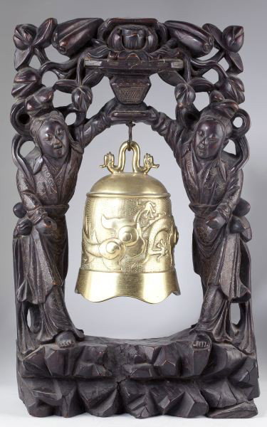 Chinese Temple Bell with Carved Frame: Chinese Temple Bell with Carved Frame the solid mahogany frame is carved in the form of two women standing on rocky ground beneath prunus branches, a cast brass bell decorated with dragons is suspende