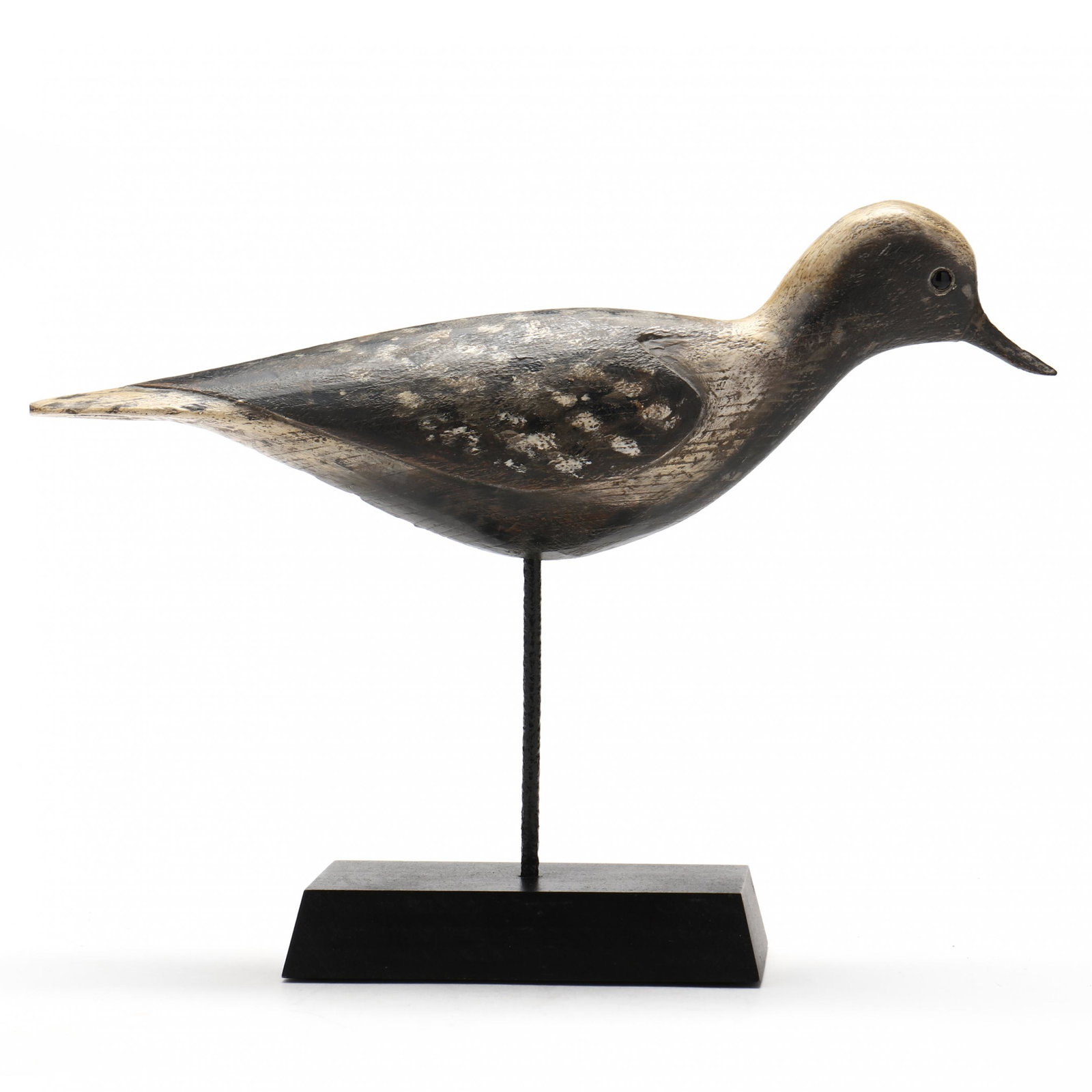 Pete "Hurricane" Peterson (VA, b. 1944), Yellowlegs: Pete "Hurricane" Peterson (VA, b. 1944), YellowlegsCape Charles, Virginia, circa 2009, carved and painted wood, branded PETE, signed and dated, on stand. Length 12 in. A wonderful shorebird carving fr