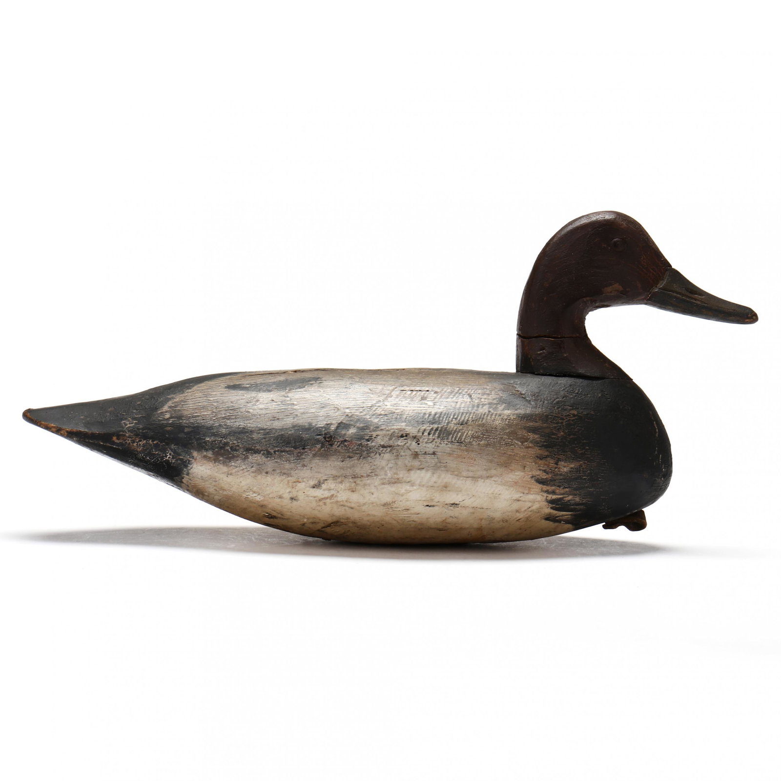 Ira Hudson (VA, 1873-1949), Canvasback: Ira Hudson (VA, 1873-1949), CanvasbackChincoteague, Virginia, circa 1930, carved and painted wood, tack eyes. Length 17.5 in. Very attractive paint details added by Hudson.