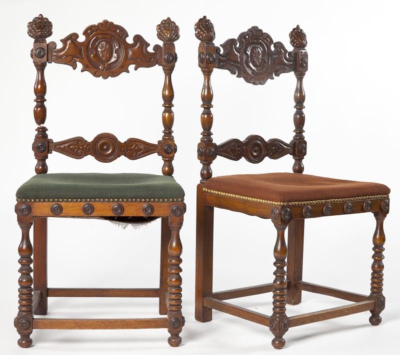 Two Spanish Style Carved Side Chairs: Two Spanish Style Carved Side Chairs early 20th century, walnut turned frame, stretchers, button decorations on seat rail, shaped slat back, scroll, crest and rosette pattern, shell shaped finials. 35