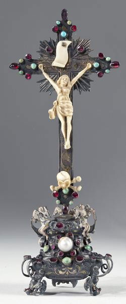 Italian Silver and Ivory Crucifix: Italian Silver and Ivory Crucifix18th century, carved ivory figure of Christ beneath ivory parchment, affixed to silver gilt cross with engraved floral and scroll decoration and inset with what are li