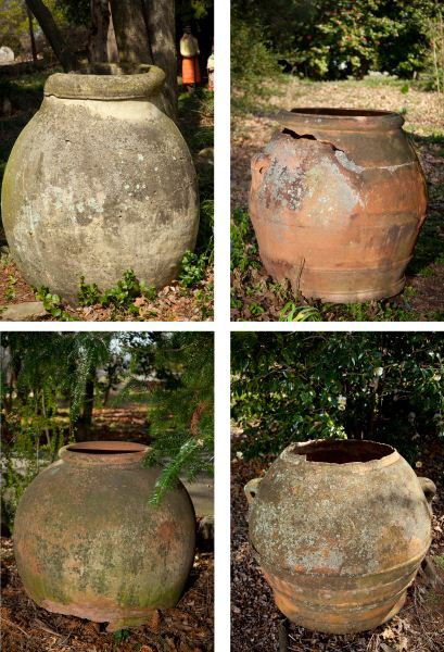 Four 19th century Italian Terracotta Oil Jars: Four 19th century Italian Terracotta Oil Jarswith tan glaze, oviform rope and diamond pattern borders, fluted top handles.36 x 30 in. various.Located at - (2) rear terrace and (2) rear of formal garde