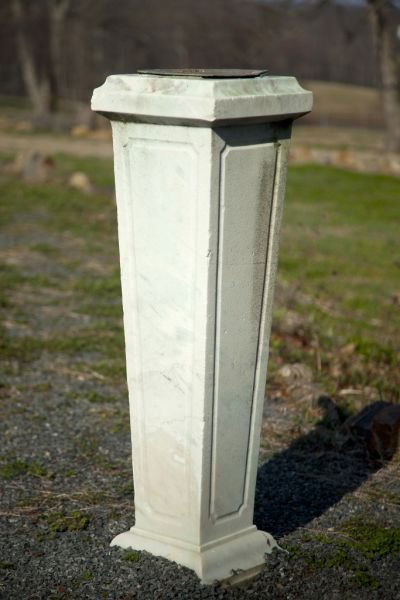 White Stone Sundial Pedestal: White Stone Sundial Pedestalbronze dial, the molded base is four-sided, tapered and paneled.43.5 x 12.75 in..