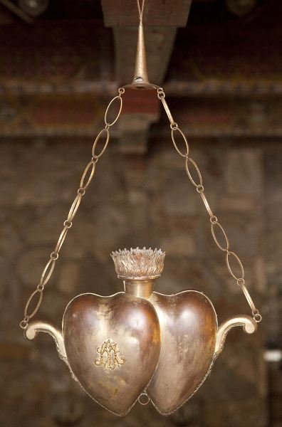 Spanish Altar Lamp: Spanish Altar Lamp 18th century, silverplate, altar vigil dual heart shaped lamp with flame finial, with applied Christogram to one side, opposite side with applied gilt monogram, hung with chains. 14