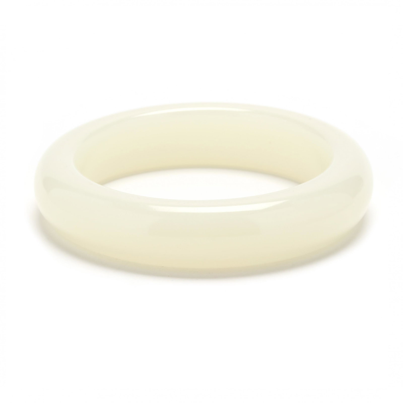 Jade Bangle: Jade Bangle carved in the round and polished with rounded exterior and flat interior. 15.6mm; 2.5 in. interior width. Additional high-resolution photos are available at www.lelandlittle.com