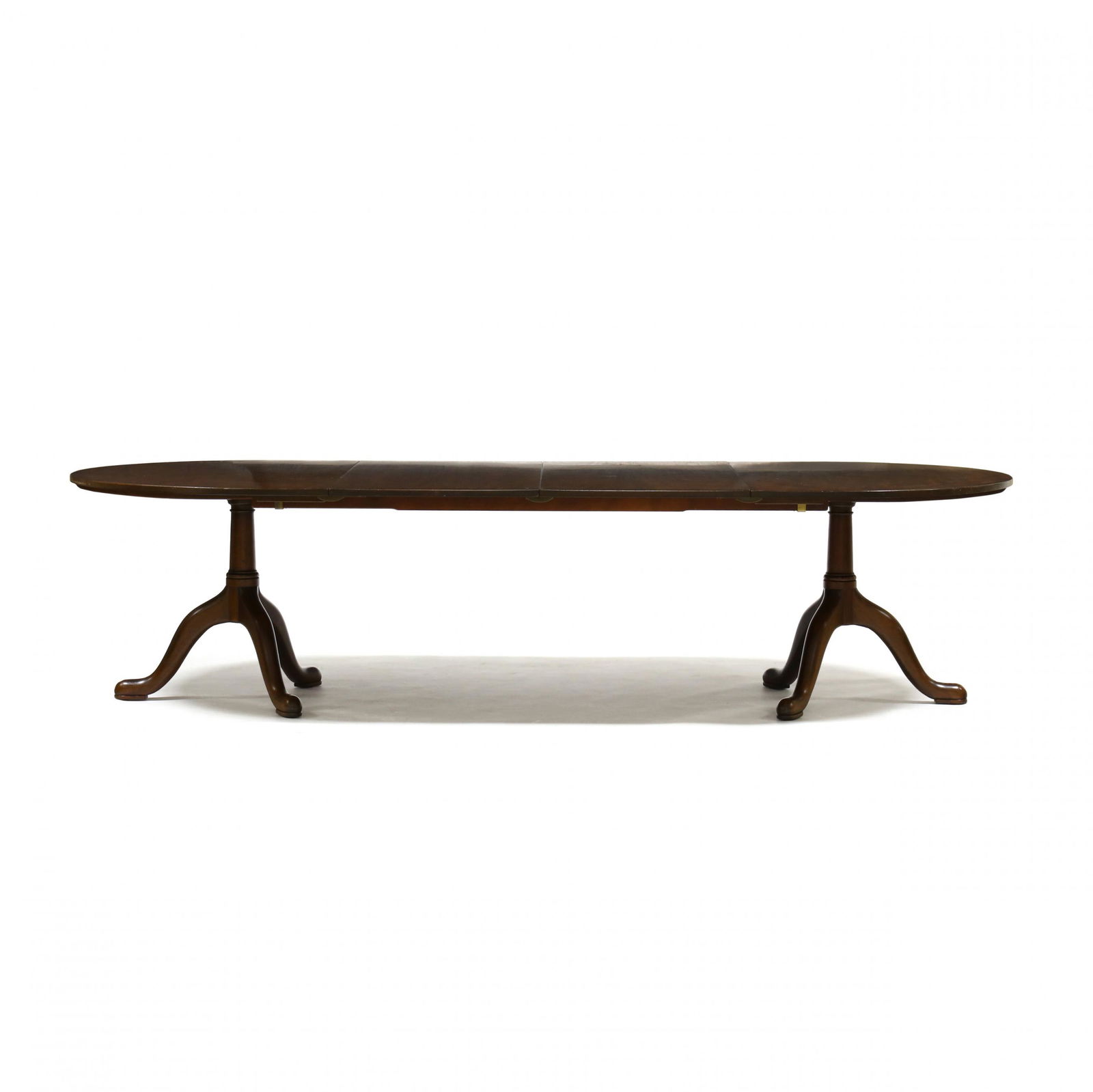 Kittinger, Queen Anne Style Double Pedestal Mahogany Dining Table: Kittinger, Queen Anne Style Double Pedestal Mahogany Dining Tablelabeled, the oval table together with two leaves, turned standard, tripod base, raised pad foot, with two support bars for the leaves.