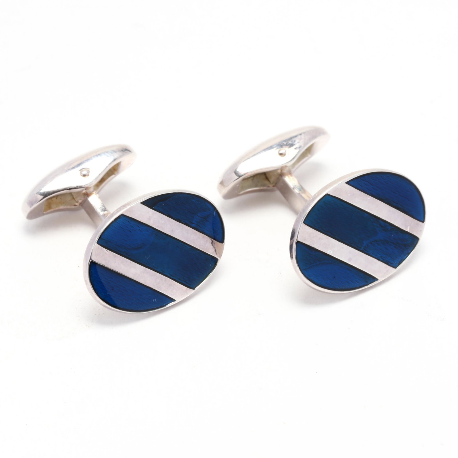 Sterling and Enamel Cufflinks, Faberge: Sterling and Enamel Cufflinks, Faberge of oval form with blue enamel ground and sterling bar accents, completed with whale backs, stamped 925 / Germany, with an additional mark and signed FabergÃ©. 