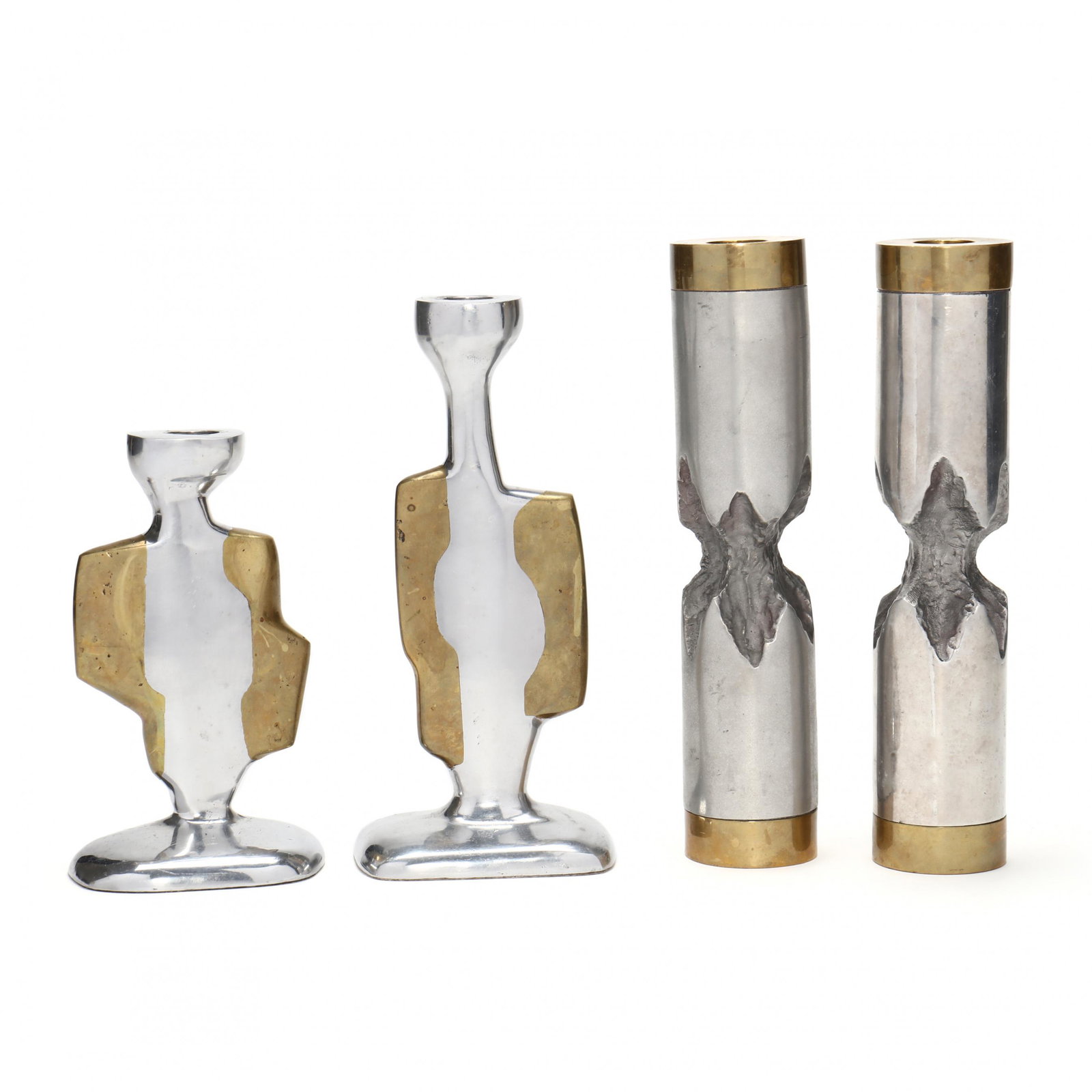 Four David Marshall Disenos Brutalist Mixed Metals Candlesticks: Four David Marshall Disenos Brutalist Mixed Metals CandlesticksSeville, Spain, last quarter 20th century, two pairs cast in aluminum and brass, each with artist cipher to base, the shorter pair additi