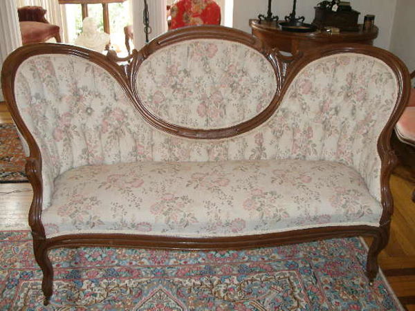 Nine Piece Victorian Parlor Suite,: Nine Piece Victorian Parlor Suite,American, 1880s, walnut, finger carved framed moldings; including a ladies and gentleman's medallion back settees, ladies and gentleman's parlor chairs, and 5 balloon