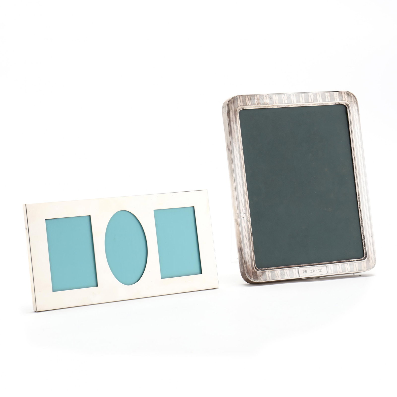 Two American Sterling Silver Picture Frames, Including Tiffany & Co.: Two American Sterling Silver Picture Frames, Including Tiffany & Co.the smaller a three window picture frame by Tiffany & Co, marked to profile, without monogram (5 x 10 in.); the second with mark of