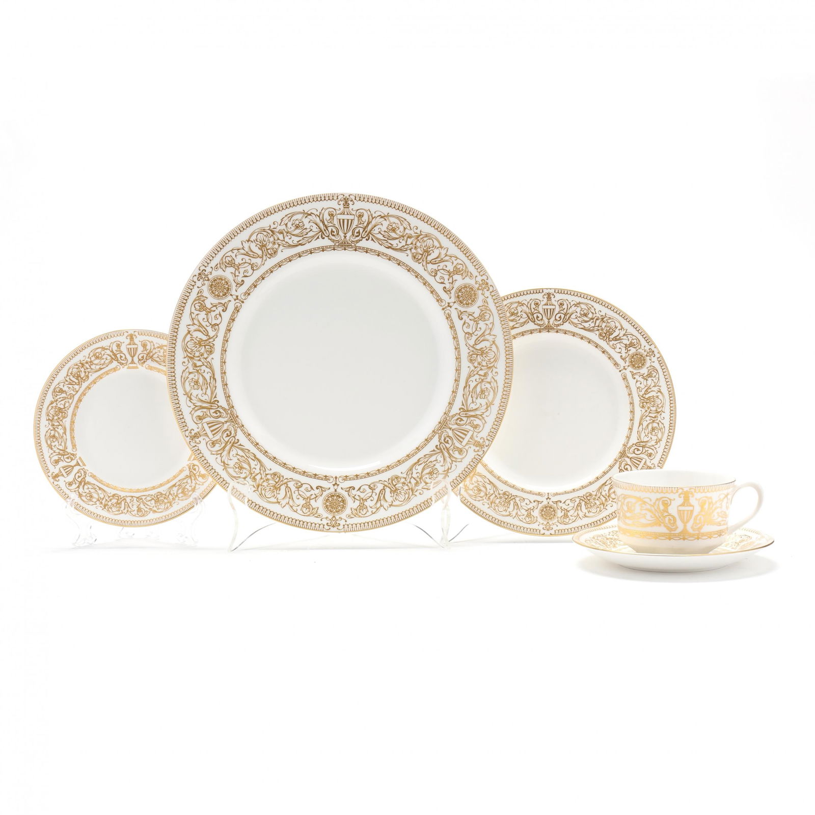 Royal Worcester Hyde Park Porcelain Dinnerware, (57) Pieces: Royal Worcester Hyde Park Porcelain Dinnerware, (57) PiecesEngland, circa 1966-1986, discontinued, having a white field with a wide border of gold scrolls divided by urns or medallions, to include: (1