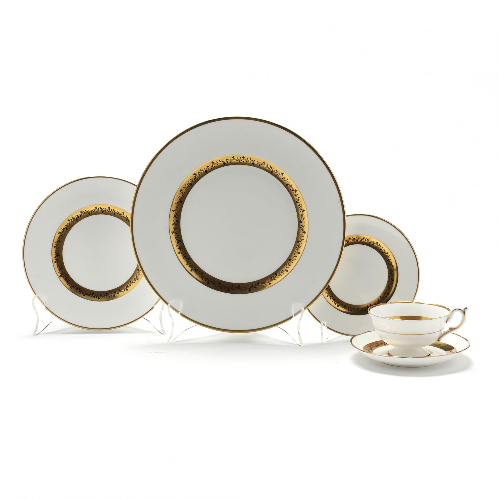 A Coalport Citation Partial Dinner Service, (79) Pieces: A Coalport Citation Partial Dinner Service, (79) Piecesmade in England, 20th century post-war backstamp, bone china with gilt and black foliate rim band motif, discontinued, includes (14) dinner plate