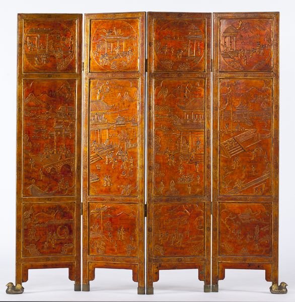 Chinese Four-Panel Folding Floor Screen: Chinese Four-Panel Folding Floor Screeneach panel featuring three vignettes of courtesans in a garden setting, reddish gold lacquer, brass caps to feet, two duck form mixed metal supports for outer fe