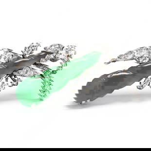 Vintage Platinum, Jadeite Jade, and Diamond Brooch: Vintage Platinum, Jadeite Jade, and Diamond Broochthe jadeite jade (29.8 x 8.2 x 5.32 mm) carved in a gourd motif suspended from the platinum foliate mount set with transitional cut and single cut dia