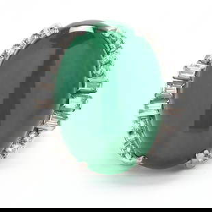 White Gold, Jadeite Jade, and Diamond Ring: White Gold, Jadeite Jade, and Diamond Ringthe oval double cabochon jadeite jade (22.50 x 15.98 x 7.80 mm) weighing approximately 25.0 carats prong set with diamond accents to the side to include full
