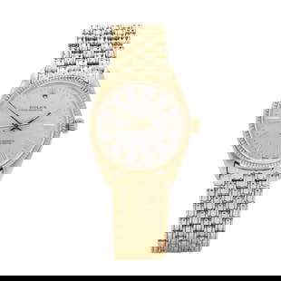 Gent's Gold Oyster Perpetual Watch, Rolex: Gent's Gold Oyster Perpetual Watch, Rolexautomatic, model number 1007, caliber number 1560, the silver tone dial with baton hour markers and luminescent baton hands, with center seconds sweep, complet