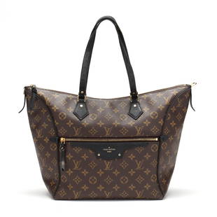 Louis Vuitton Monogram Canvas Tournelle MM Tote: Louis Vuitton Monogram Canvas Tournelle MM Tote made in France of coated monogram canvas with black leather trim, this bag features calfskin leather strap handles, a zipper pull, and a frontal name