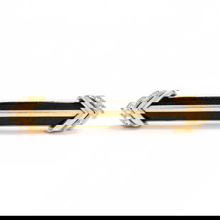 Gold and Gem-Set Arrow Brooch / Pendant, Andrew Clunn: Gold and Gem-Set Arrow Brooch / Pendant, Andrew Clunnthe Art Deco style double pointed arrow bar brooch with center onyx plaques and the points bead set with full cut round diamond melee, with single