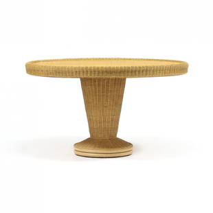 Contemporary Wicker Pedestal Breakfast Table: Contemporary Wicker Pedestal Breakfast Tablecontemporary, likely Modern History, two part form, circular top with raised rounded edge, tapered weighted pedestal base, appears unmarked. 30 x 54 in. dia